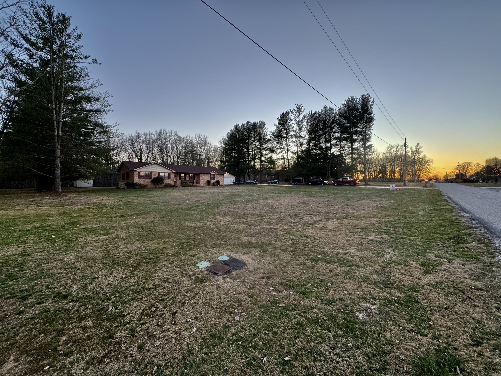 510 Brandon Road Manchester, TN 37355 - Photo 2 of 50 a view of a field with trees in the background