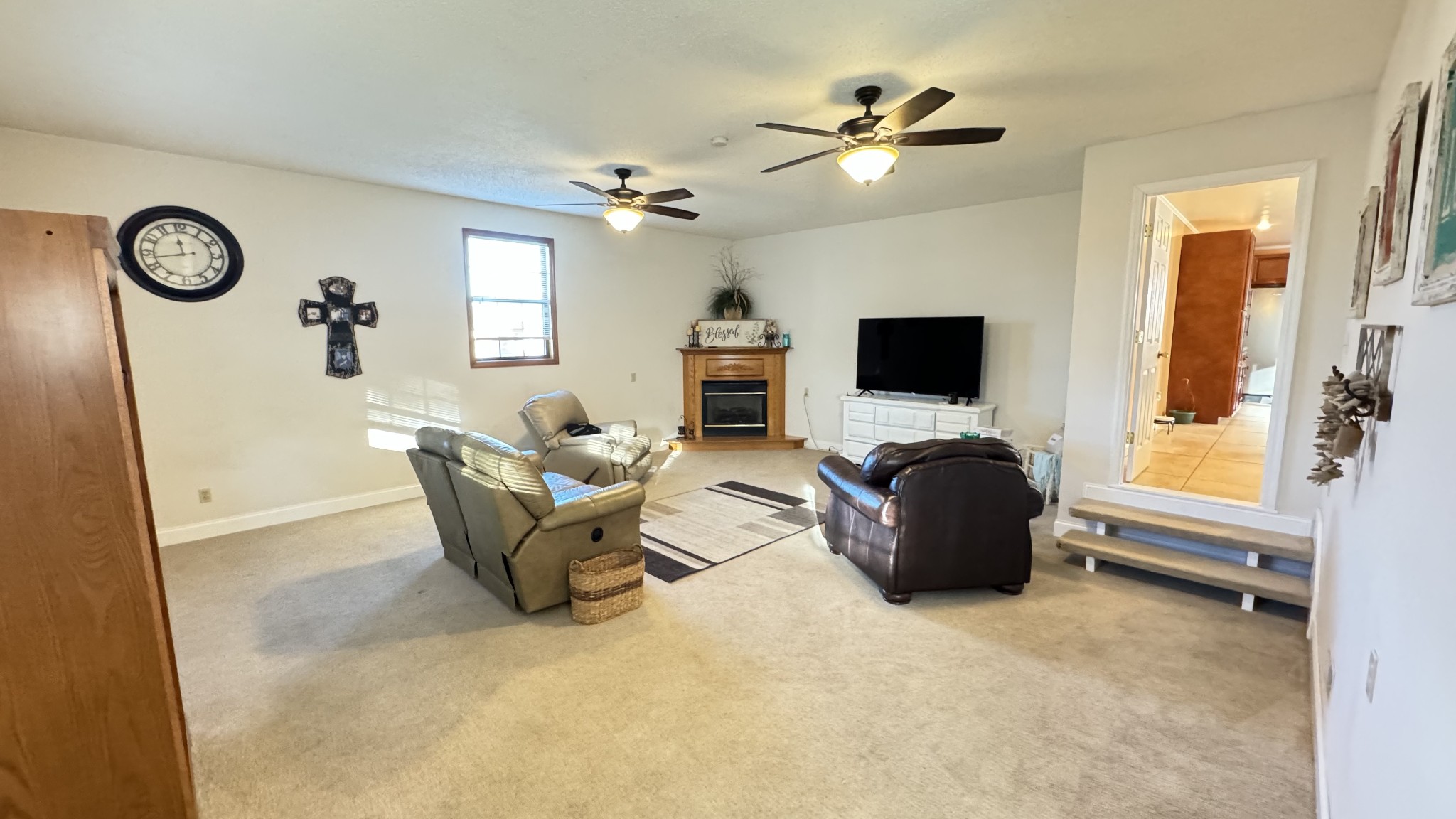 510 Brandon Road Manchester, TN 37355 - Photo 23 of 50 a living room with furniture a fireplace and a flat screen tv
