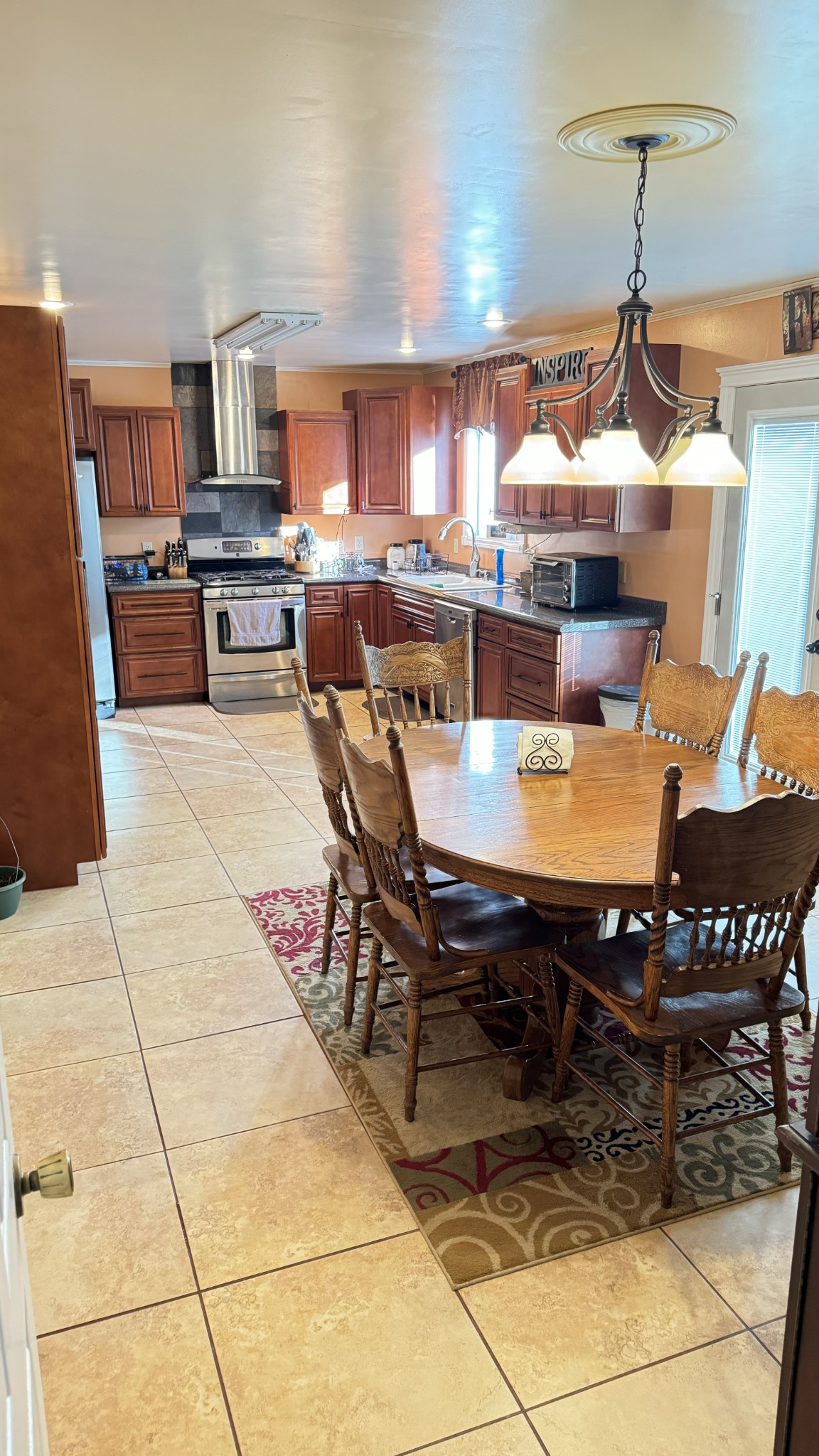 510 Brandon Road Manchester, TN 37355 - Photo 27 of 50 a kitchen with a dining table and chairs