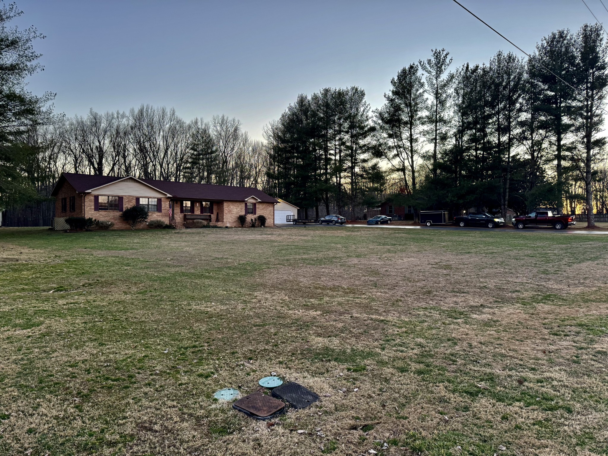 510 Brandon Road Manchester, TN 37355 - Photo 3 of 50 a view of a field with trees in the background