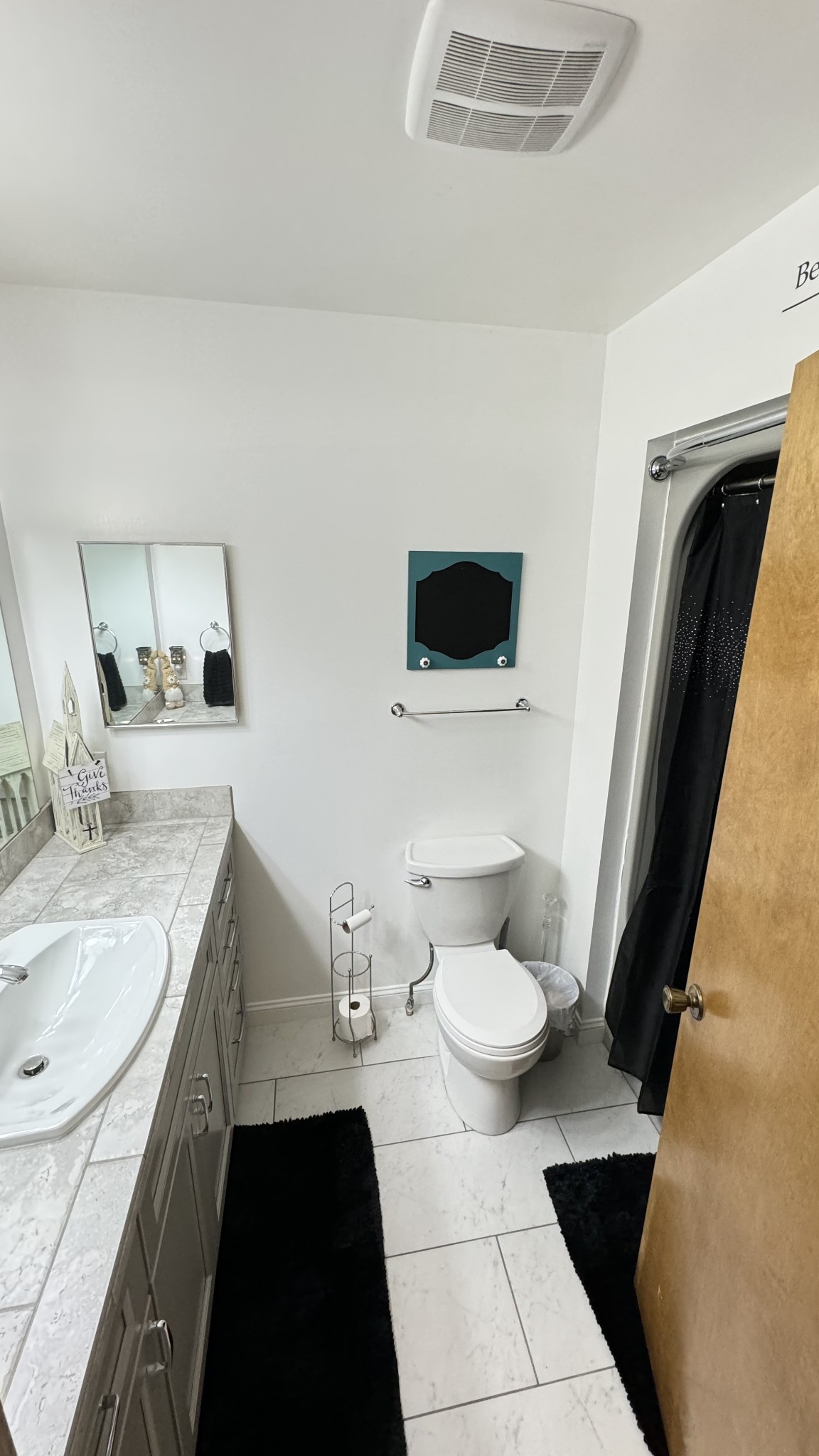 510 Brandon Road Manchester, TN 37355 - Photo 38 of 50 a bathroom with a granite countertop sink and a mirror
