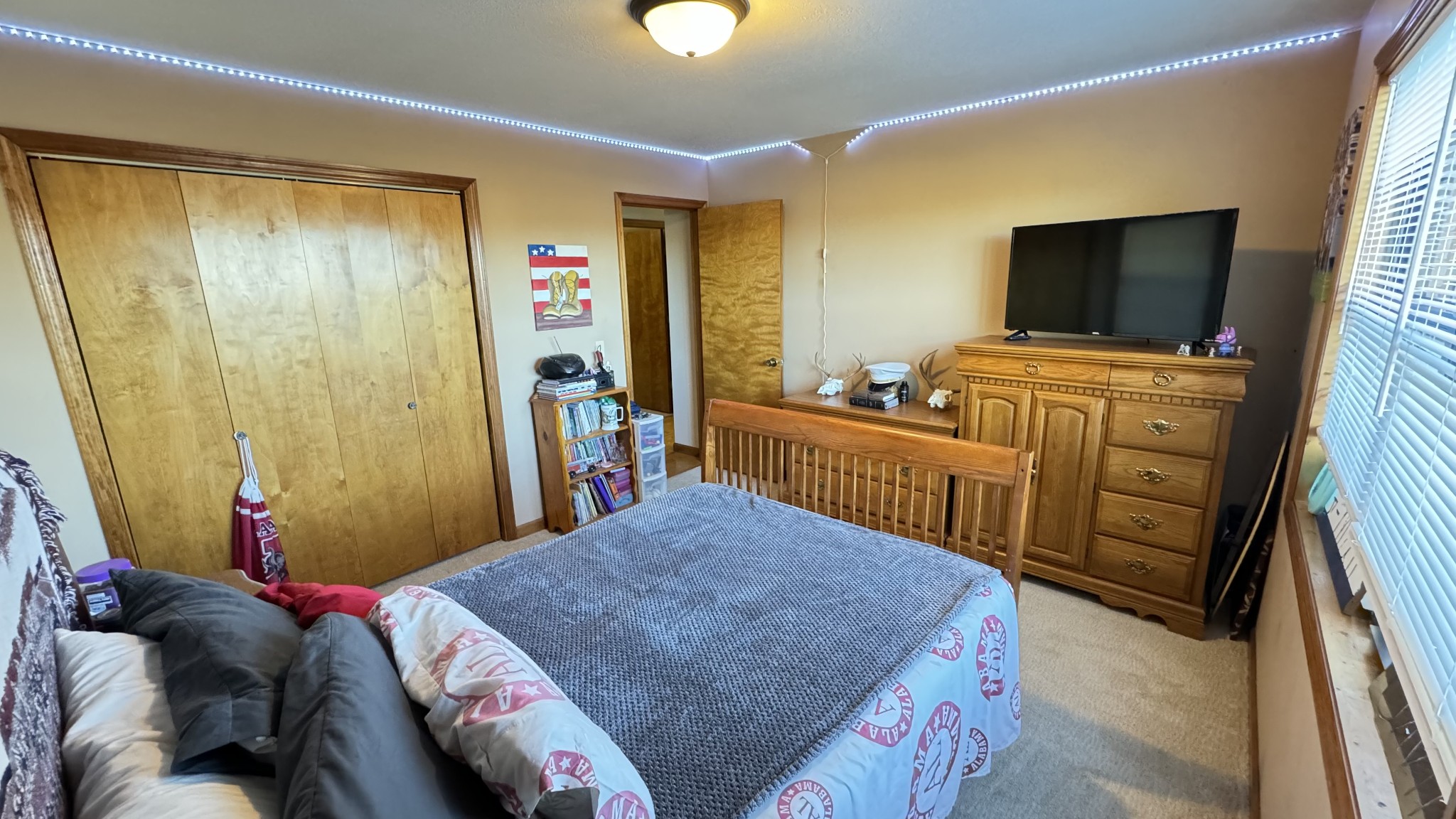 510 Brandon Road Manchester, TN 37355 - Photo 44 of 50 a bedroom with a bed and flat screen tv