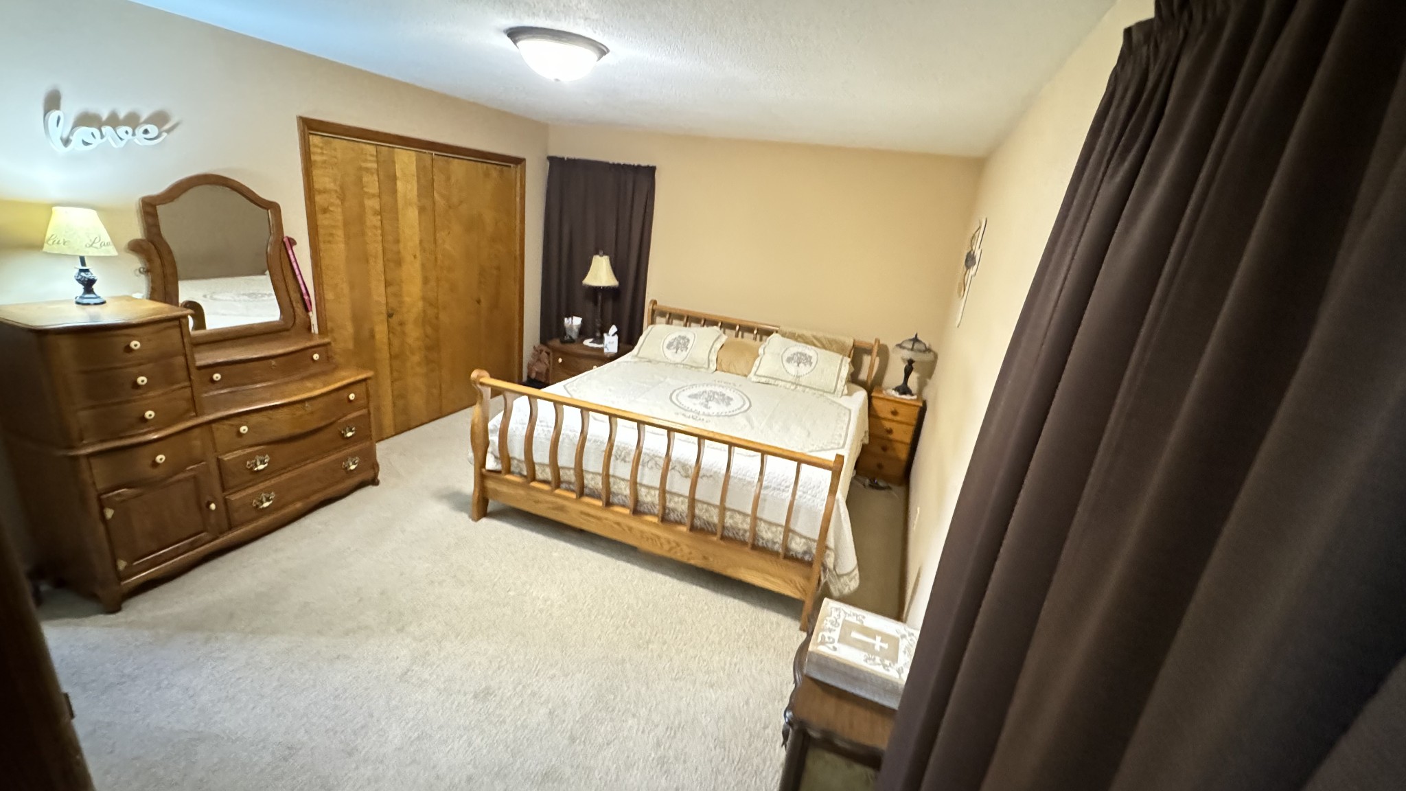 510 Brandon Road Manchester, TN 37355 - Photo 47 of 50 a bedroom with a bed and wooden floor