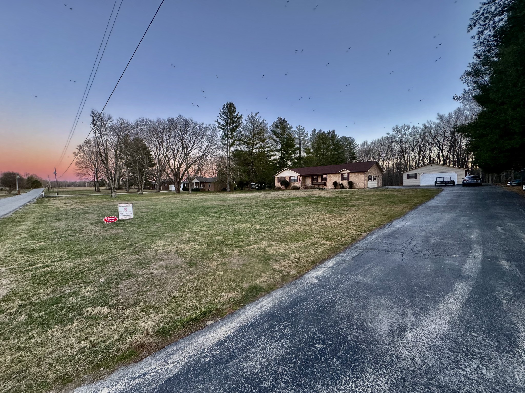 510 Brandon Road Manchester, TN 37355 - Photo 10 of 50 a view of a field with tree in the background