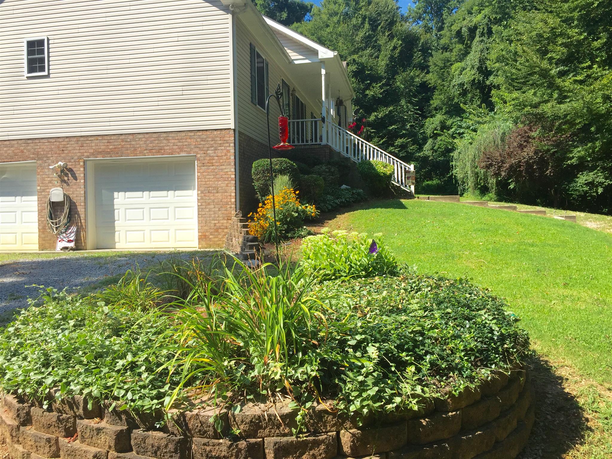 6762 New Chapel Road Springfield, TN 37172 - Photo 29 of 30 a front view of a house with a yard