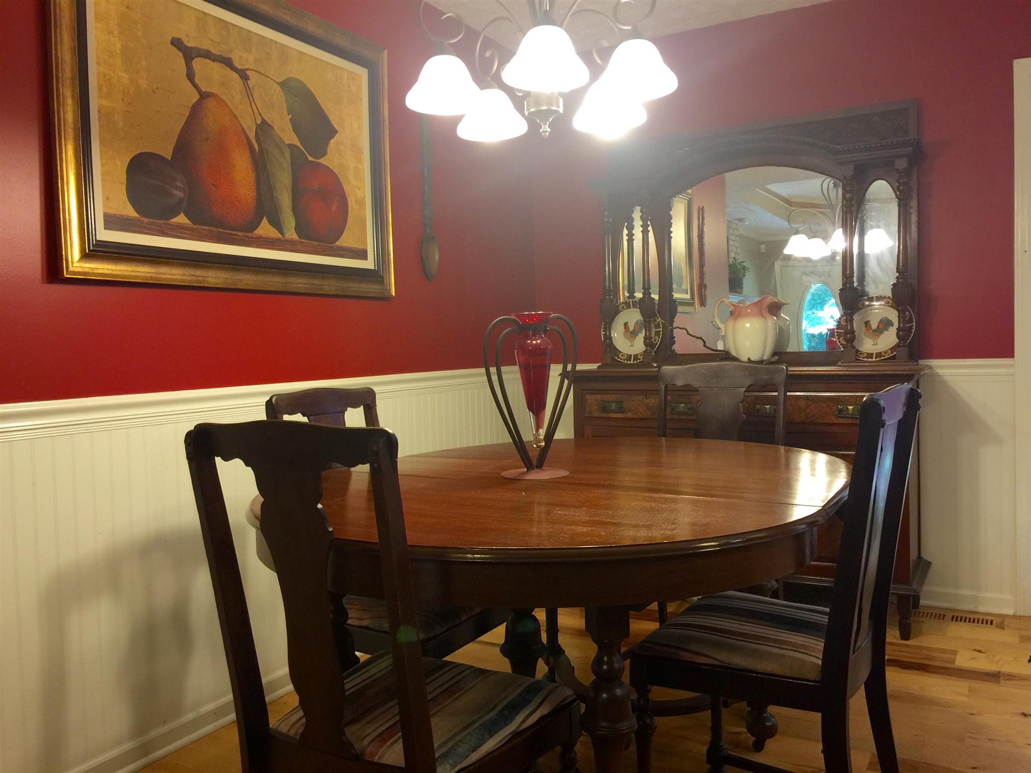 6762 New Chapel Road Springfield, TN 37172 - Photo 8 of 30 a dining room with furniture and chandelier