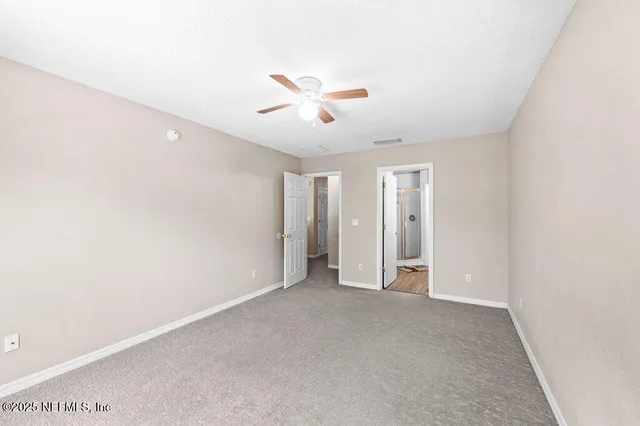 a bathroom with a sink double vanity and a shower