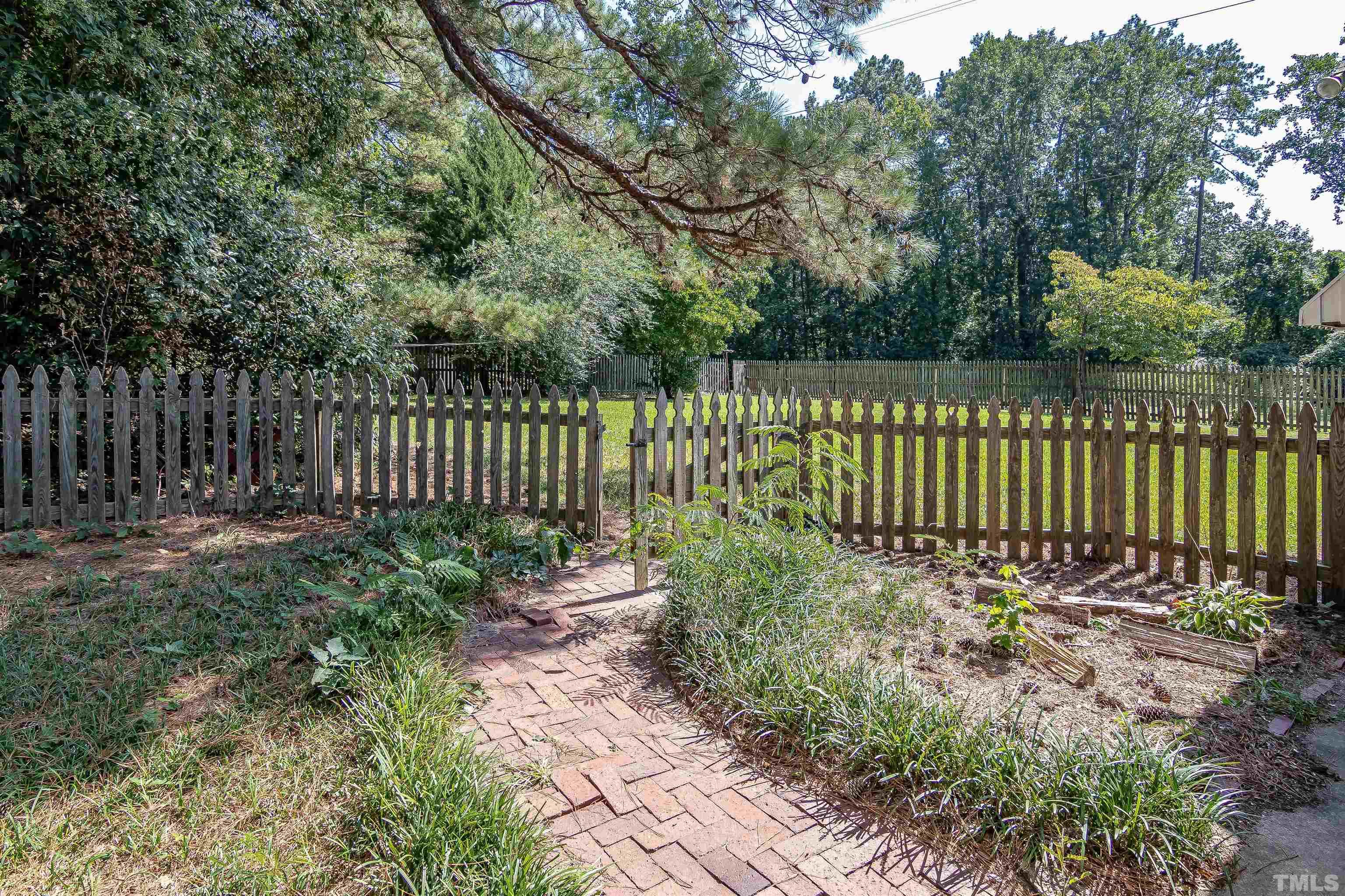 557 Rose Lane Raleigh, NC 27610 - Photo 17 of 23 Fenced Back Yard