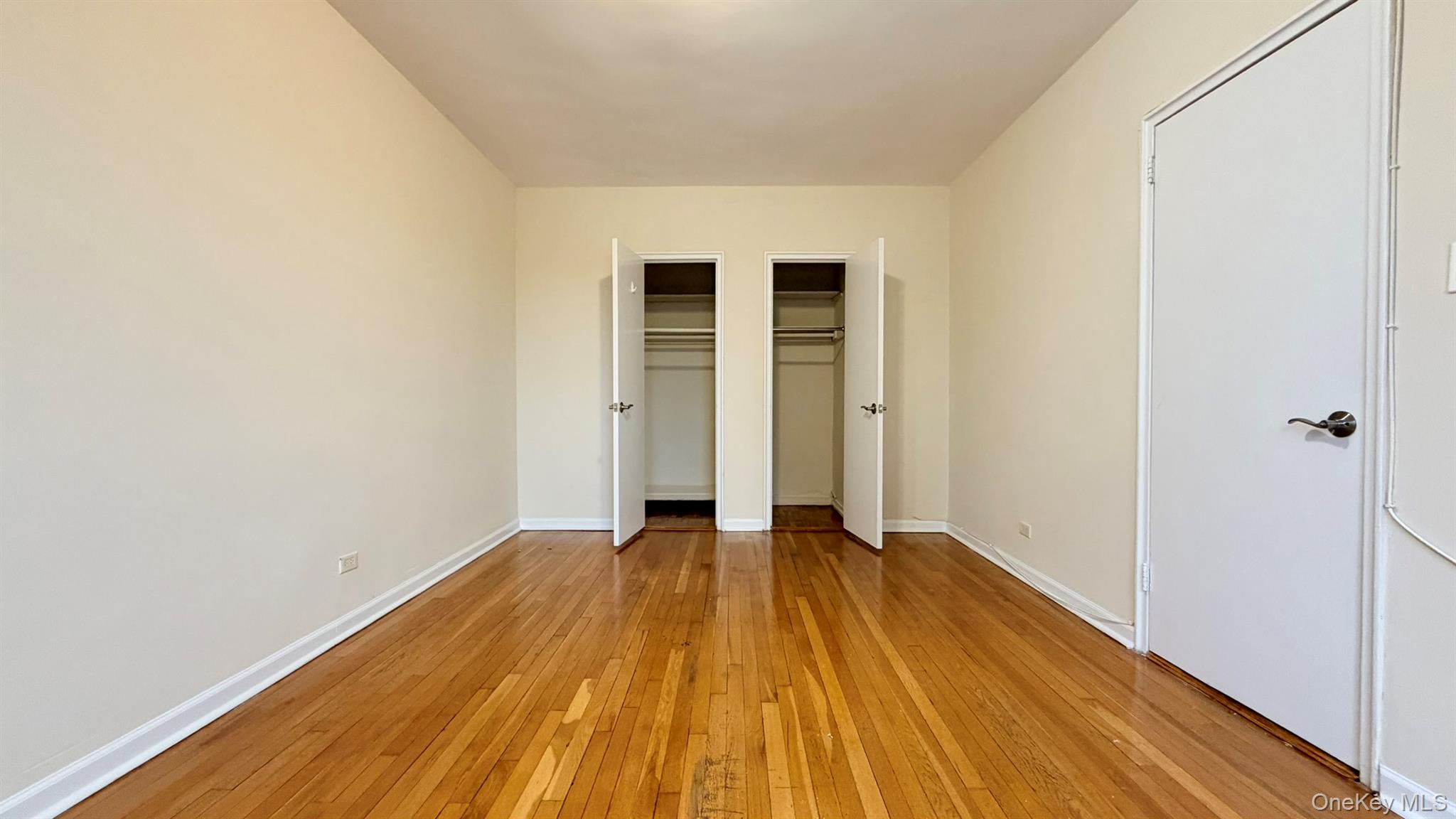 112-15 72nd Road, Unit 602 Queens, NY 11375 - Photo 7 of 12 a view of a room with wooden floor