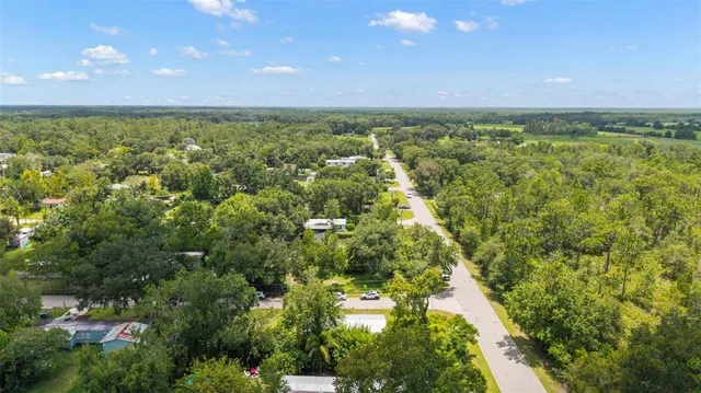 a view of an ocean and a yard