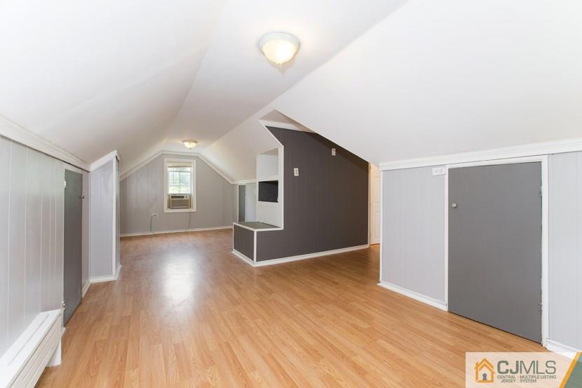 613 Old Post Road Edison, NJ 08817 - Photo 13 of 20 a view of a livingroom with wooden floor