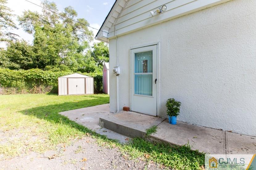 613 Old Post Road Edison, NJ 08817 - Photo 10 of 20 a view of a back yard of the house