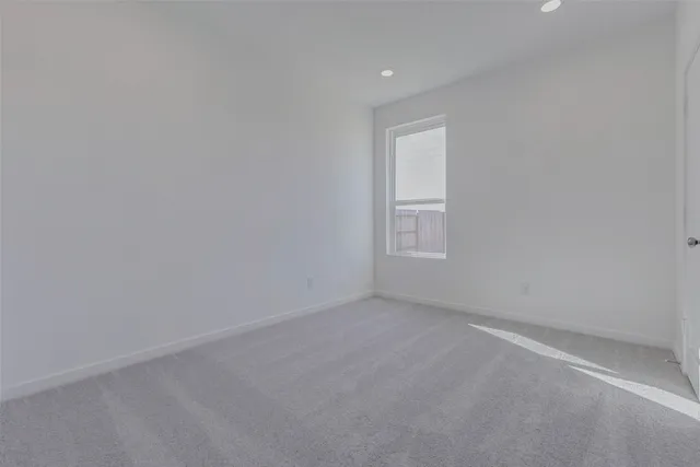 a kitchen with cabinets and stainless steel appliances
