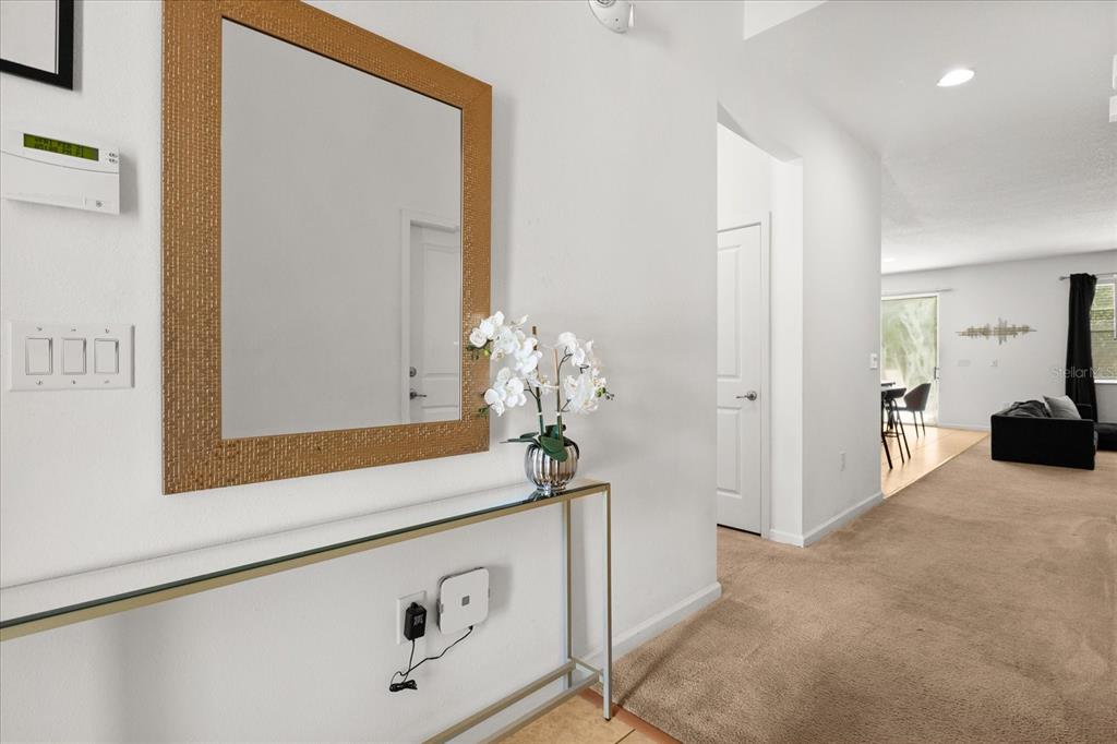 4565 Cabello Loop Kissimmee, FL 34746 - Photo 16 of 33 a view of a hallway view with staircase