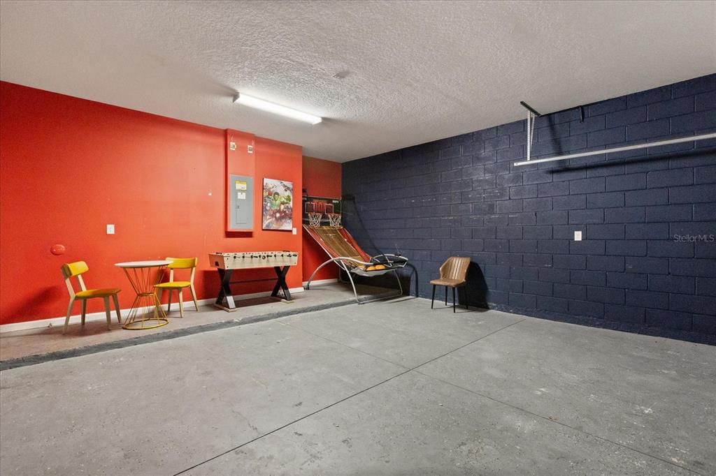 4565 Cabello Loop Kissimmee, FL 34746 - Photo 28 of 33 a view of a room with gym equipment