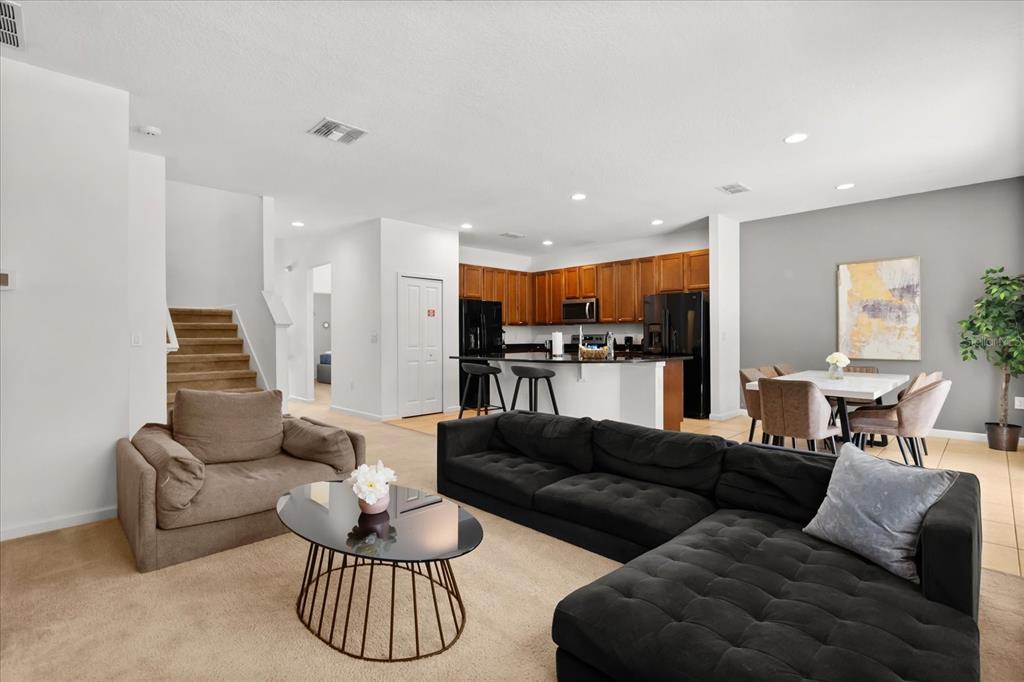 4565 Cabello Loop Kissimmee, FL 34746 - Photo 5 of 33 a living room with furniture and kitchen view