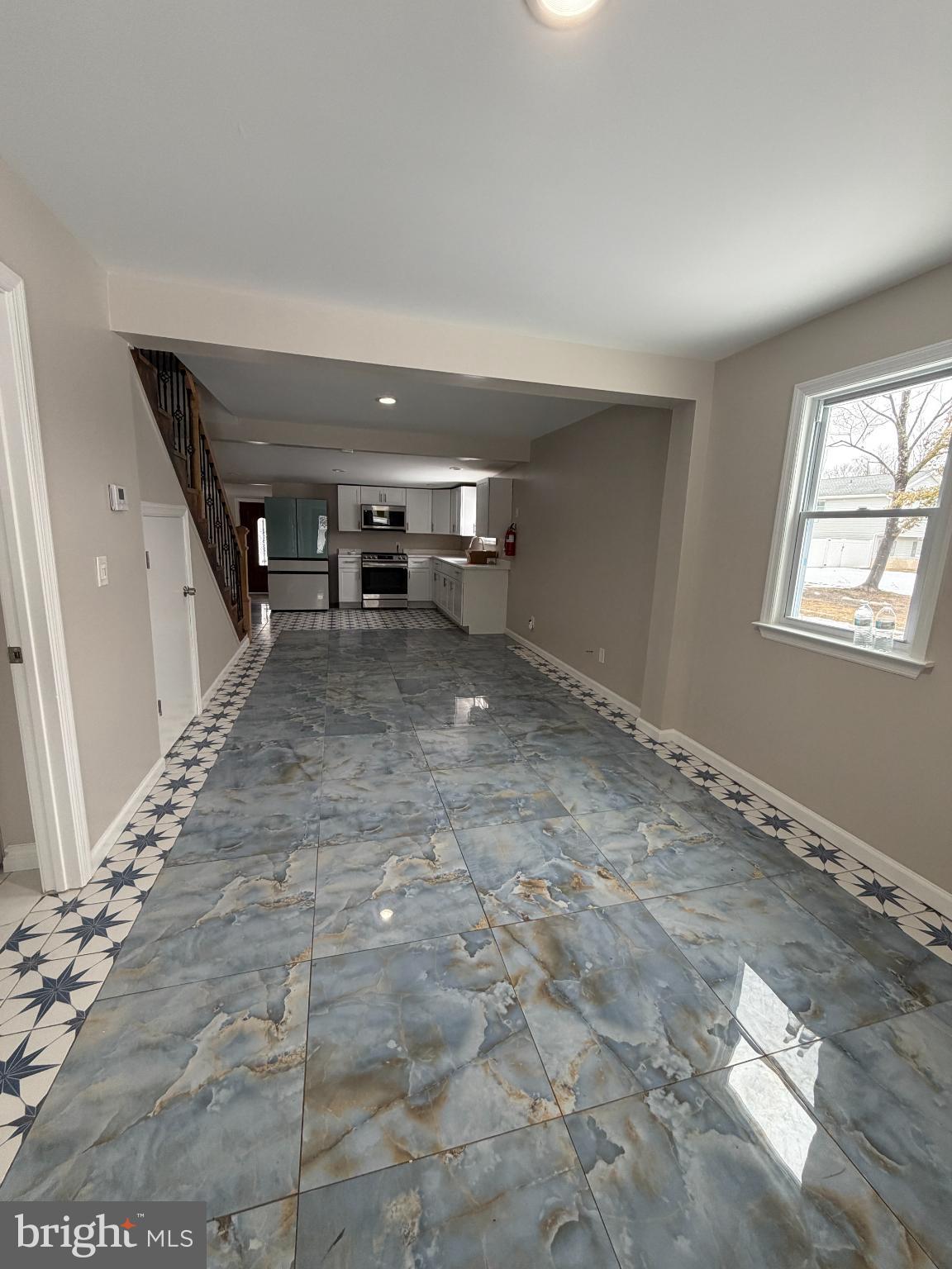 1059 Porchtown Road Franklinville, NJ 08322 - Photo 4 of 13 a view of a livingroom with wooden floor and stairs