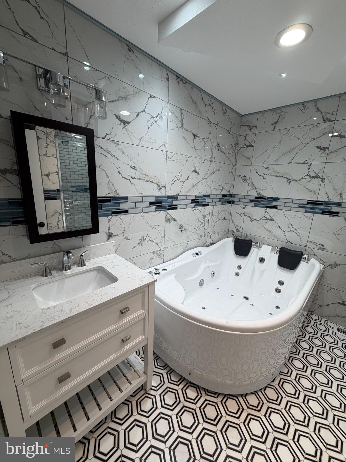 1059 Porchtown Road Franklinville, NJ 08322 - Photo 5 of 13 a view of a bathroom sink with a tub and mirror