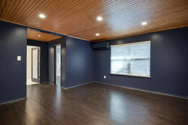 a bathroom with a sink a mirror and a bathtub