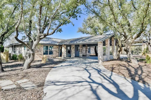 a view of house with yard