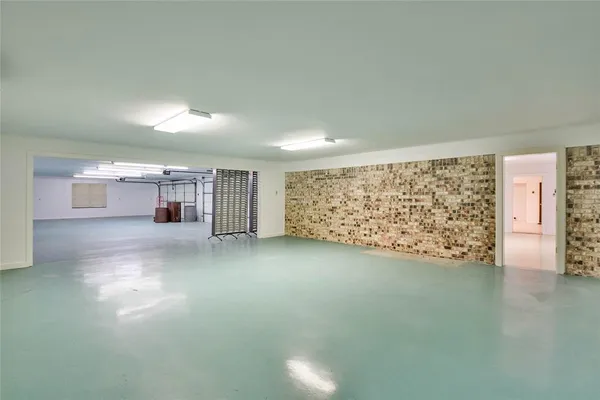 a view of a building with a garage