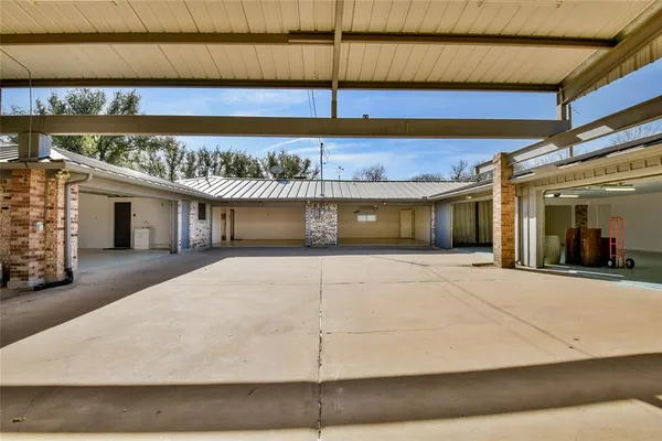 a view of backyard with a table and chair