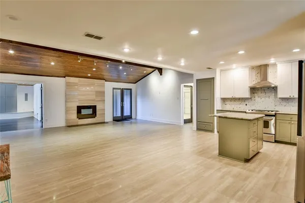 a view of a kitchen with a sink and a microwave