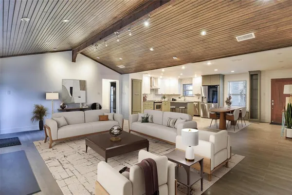 a view of a livingroom with furniture