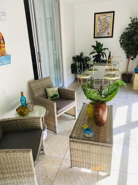 6461 Northwest 2nd Avenue, Unit FIVE Boca Raton, FL 33487 - Photo 37 of 61 LANAI RELAXING AREA