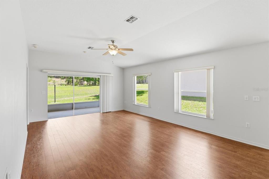 826 West Cockatiel Loop Hernando, FL 34442 - Photo 3 of 40 a view of an empty room with a window