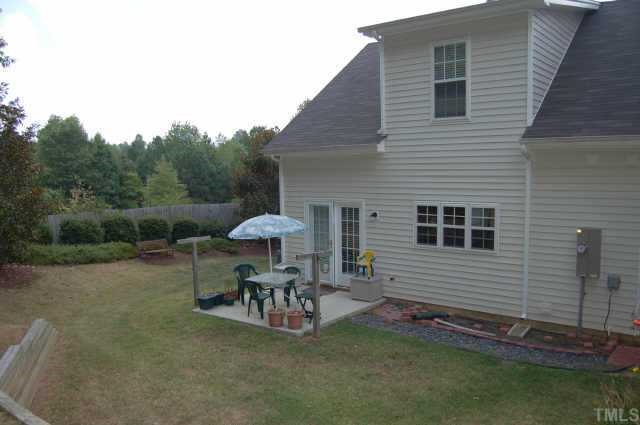 800 Rothshire Court Raleigh, NC 27615 - Photo 7 of 7 a view of a house with backyard and sitting area