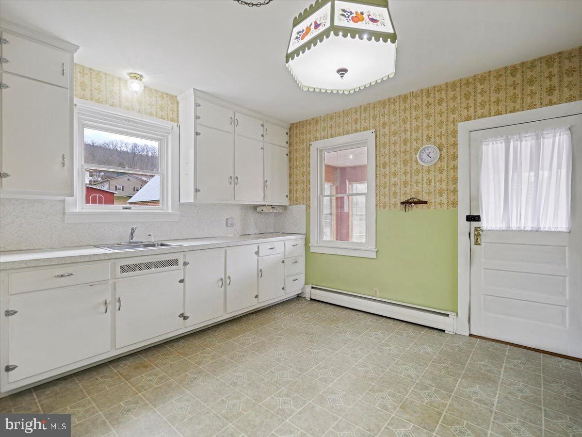 7220 Slabtown Road Waynesboro, PA 17268 - Photo 13 of 43 a view of cabinets a window and a projector room