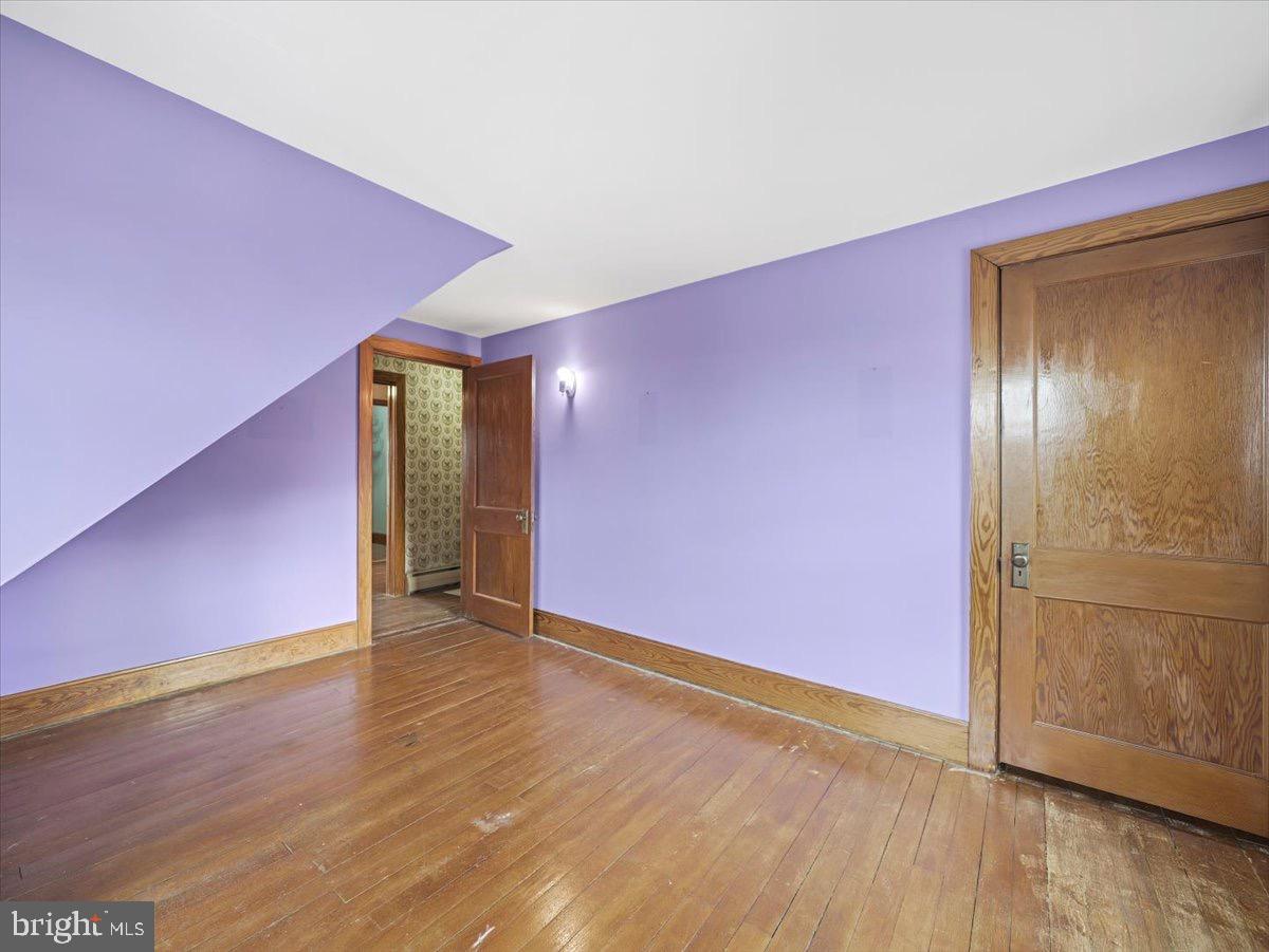 7220 Slabtown Road Waynesboro, PA 17268 - Photo 20 of 43 a view of an empty room with wooden floor