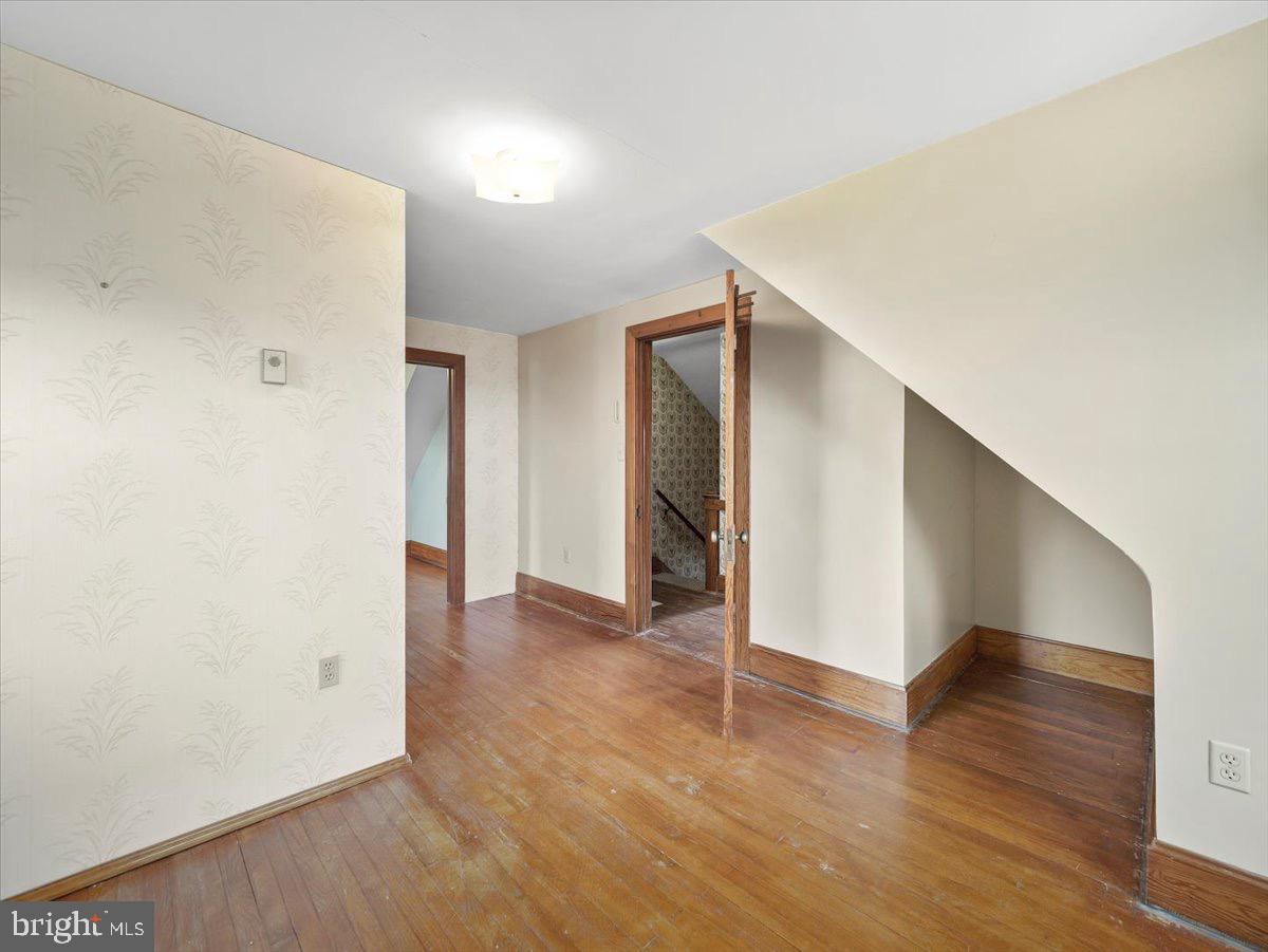7220 Slabtown Road Waynesboro, PA 17268 - Photo 22 of 43 a view of an empty room with wooden floor
