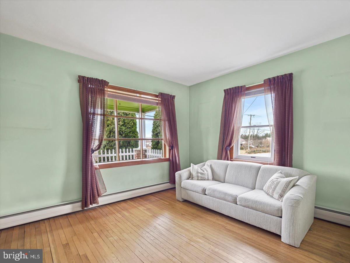 7220 Slabtown Road Waynesboro, PA 17268 - Photo 7 of 43 a living room with furniture and a window