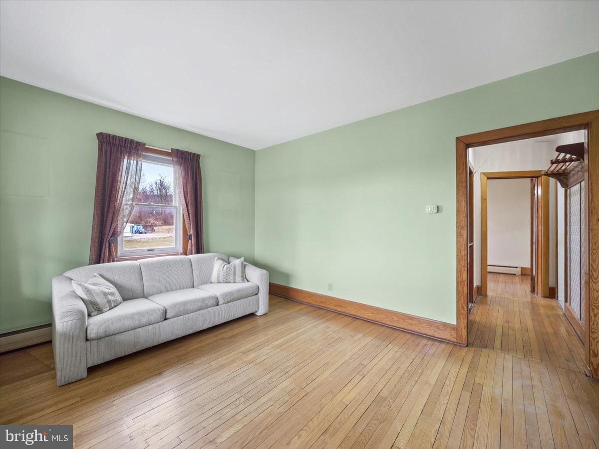 7220 Slabtown Road Waynesboro, PA 17268 - Photo 8 of 43 a living room with furniture and a hard wood floor