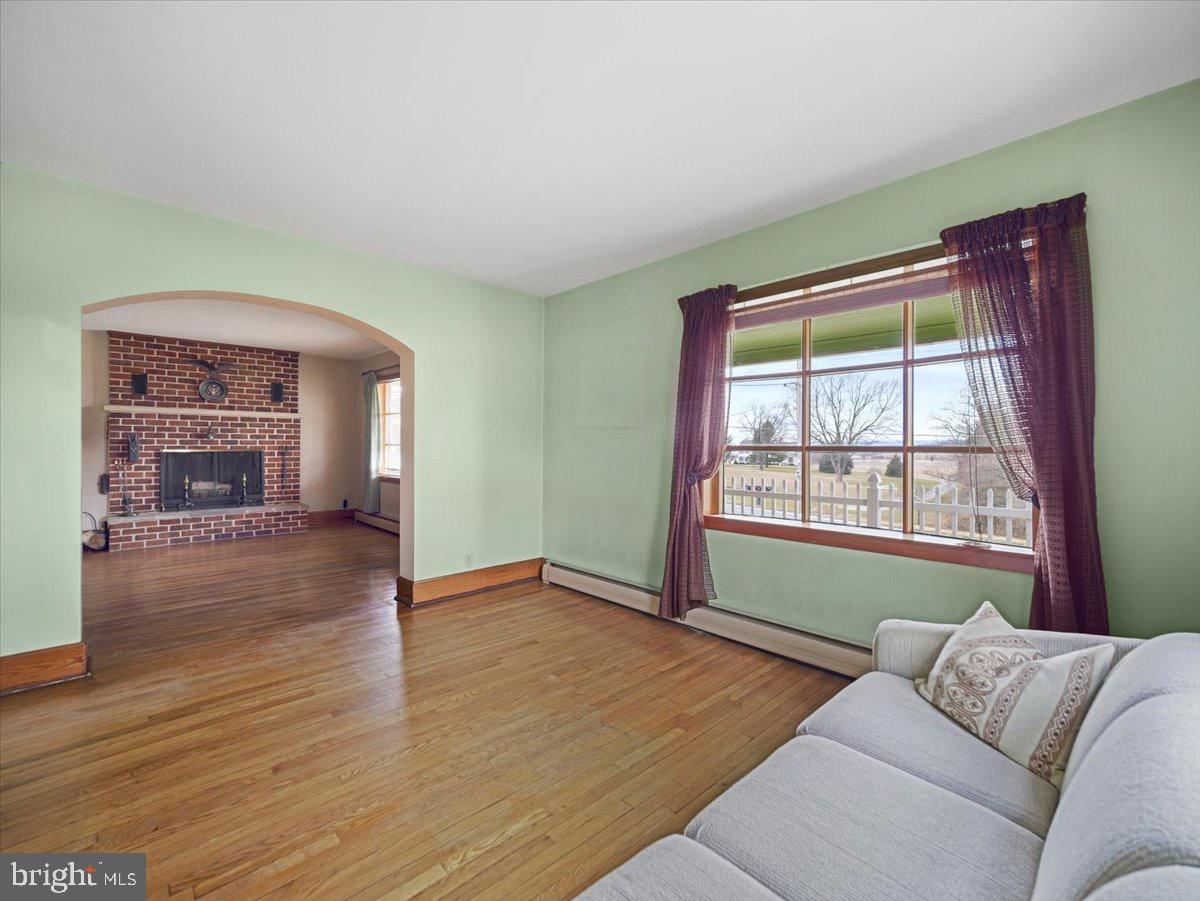 7220 Slabtown Road Waynesboro, PA 17268 - Photo 9 of 43 a living room with furniture and a window