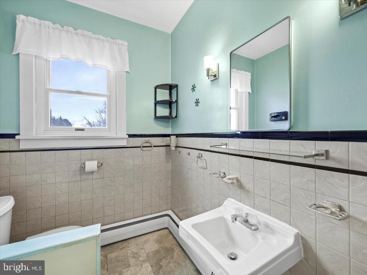 7220 Slabtown Road Waynesboro, PA 17268 - Photo 10 of 43 a bathroom with a sink and mirror