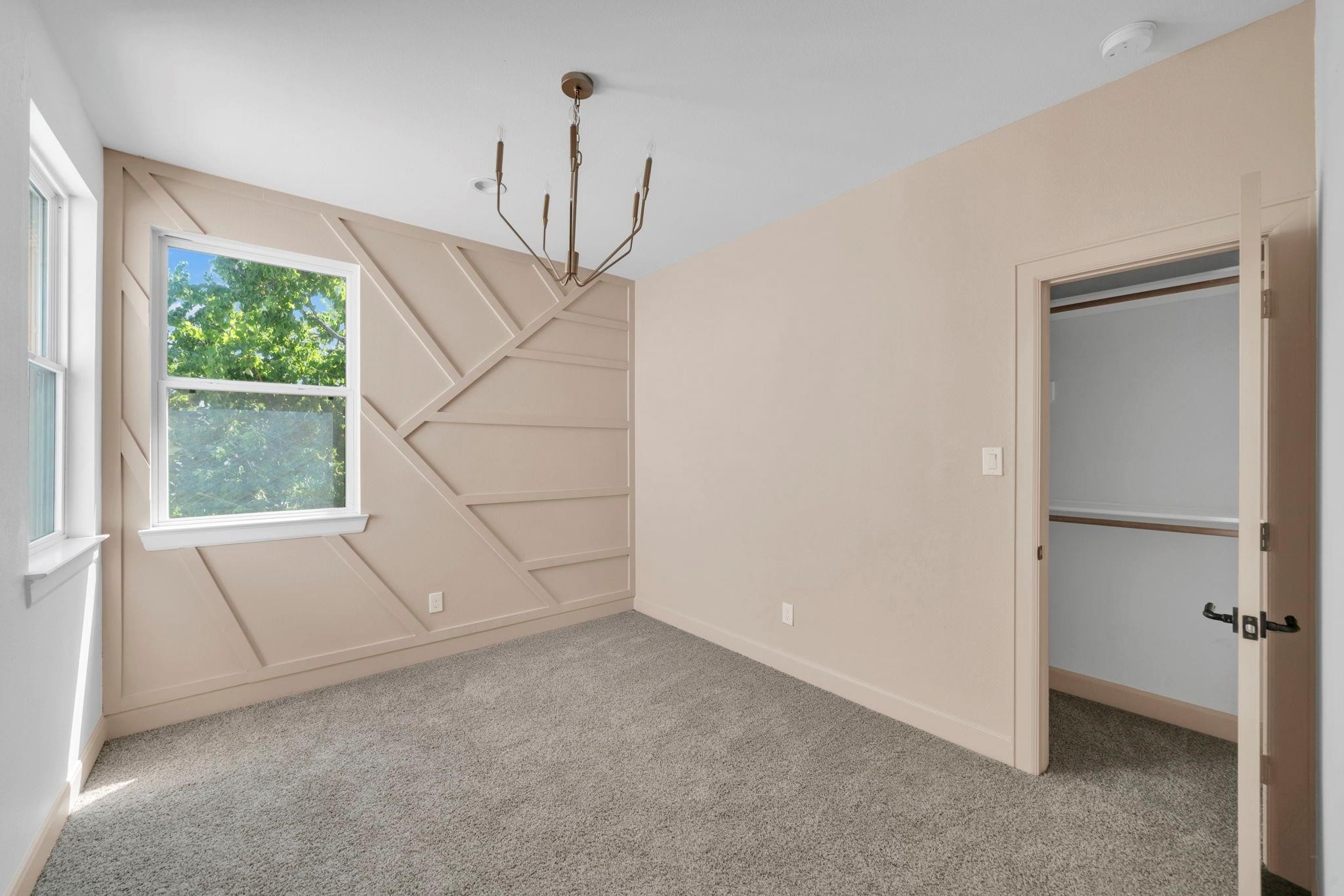 9551 Neuens Road, Unit B Houston, TX 77080 - Photo 25 of 34 a view of an empty room with a window