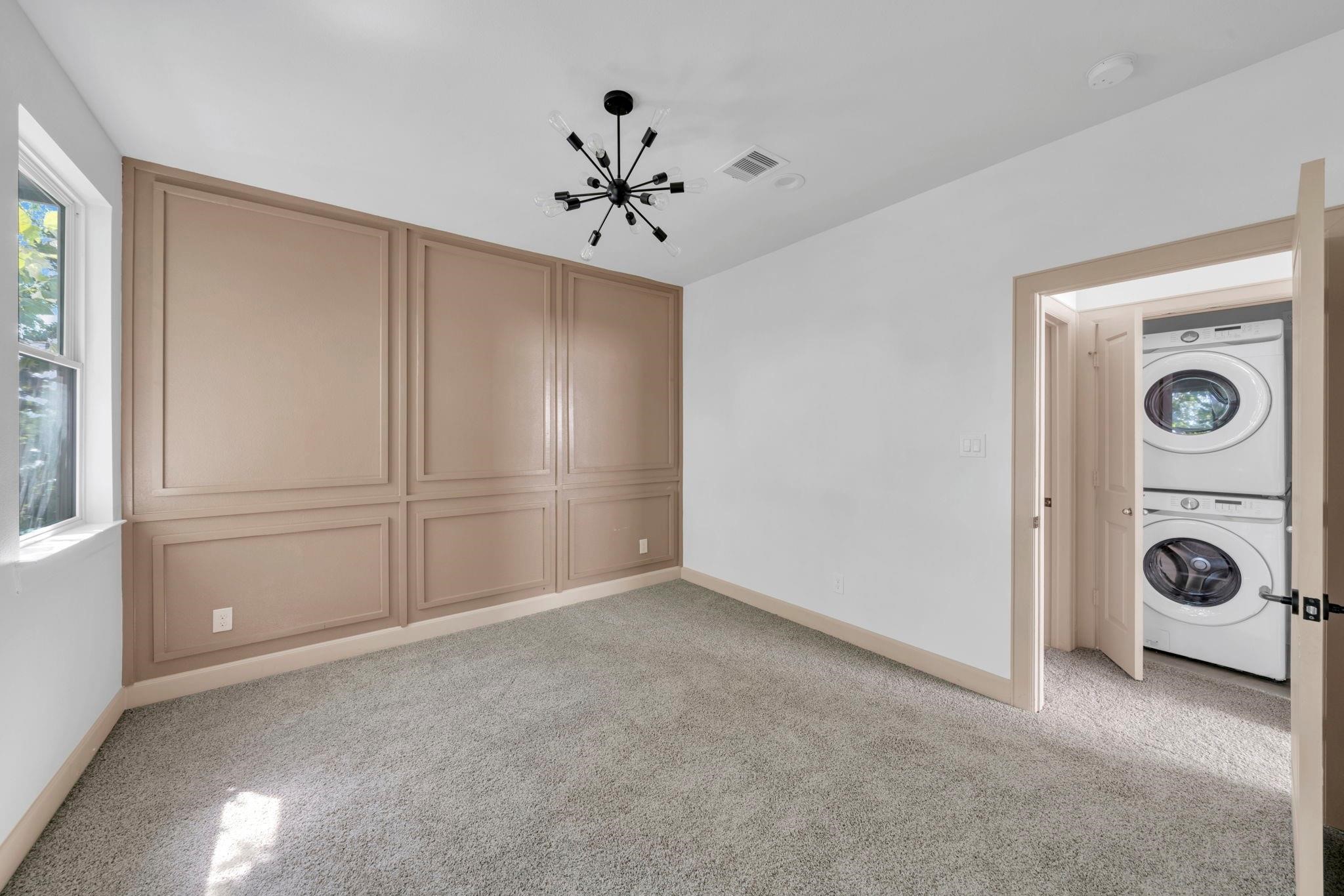 9551 Neuens Road, Unit B Houston, TX 77080 - Photo 29 of 34 a view of a livingroom with a chandelier
