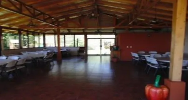 a lobby with furniture and floor to ceiling window