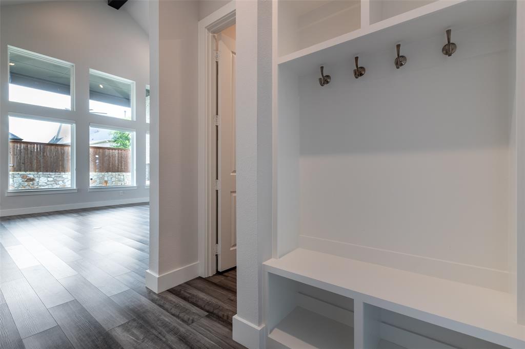 8003 Splitbeard Road Frisco, TX 75035 - Photo 19 of 40 a bathroom with a bathtub and a shower