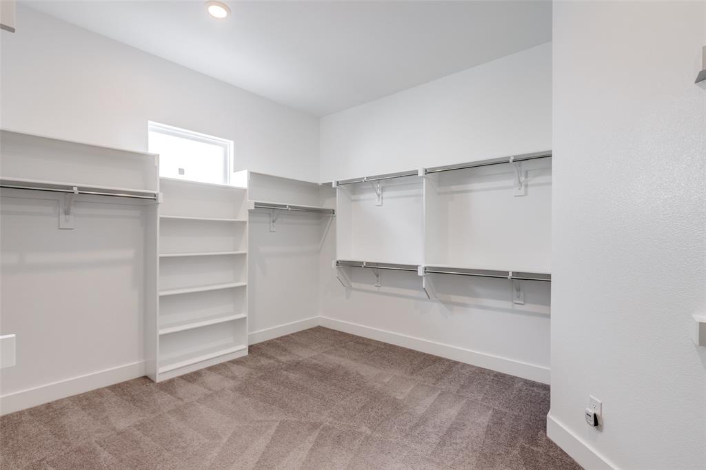 8003 Splitbeard Road Frisco, TX 75035 - Photo 28 of 40 a view of an empty walk in closet