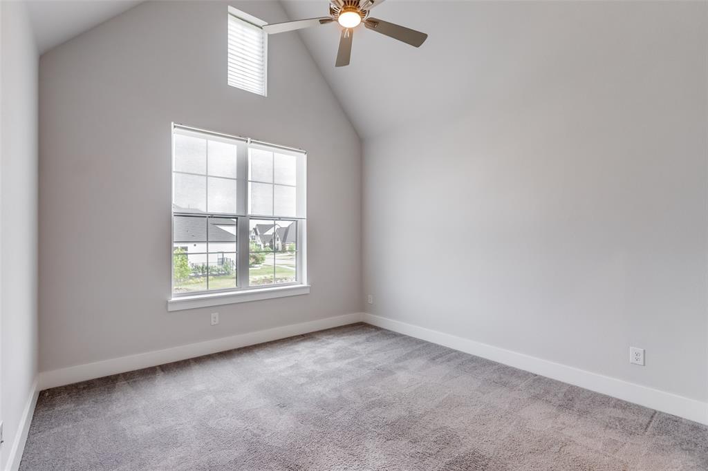 8003 Splitbeard Road Frisco, TX 75035 - Photo 32 of 40 an empty room with a window