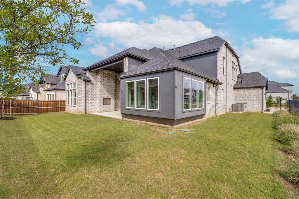 8003 Splitbeard Road Frisco, TX 75035 - Photo 38 of 40 a view of a house with a garden