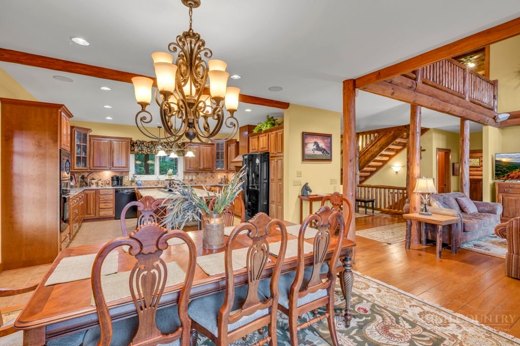 160 Outback Road Ferguson, NC 28624 - Photo 21 of 49 a very nice looking dining room with furniture water and chandelier