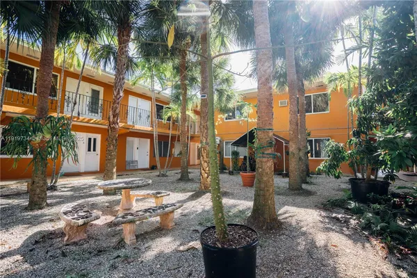 a front view of a building with street view