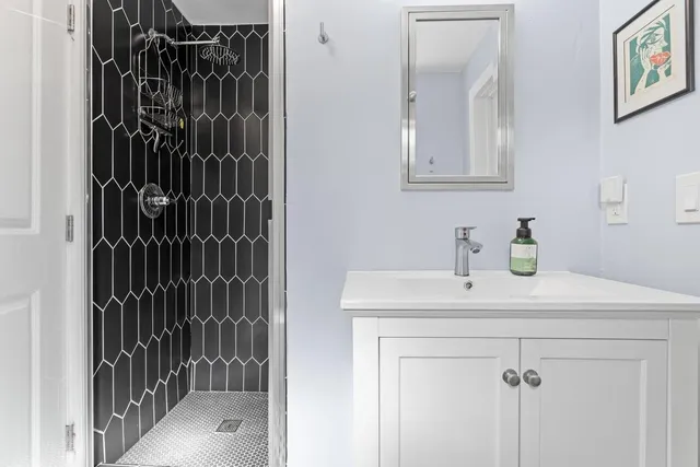 a close view of a sink and mirror