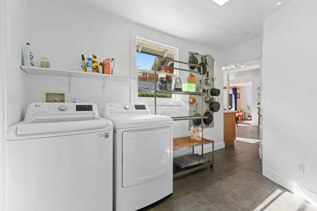 a view of balcony with seating space and wooden floor