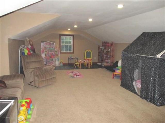 1406 Joe Williams Road Loretto, TN 38469 - Photo 10 of 20 a living room with furniture and a flat screen tv